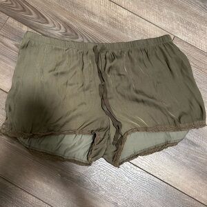 These are silky, dark green lounge shorts from aerie.
